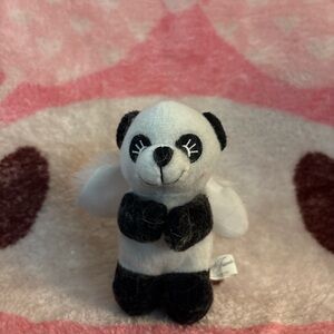 Super kawaii and cute Angel Plush Panda black and white stuffed animal.